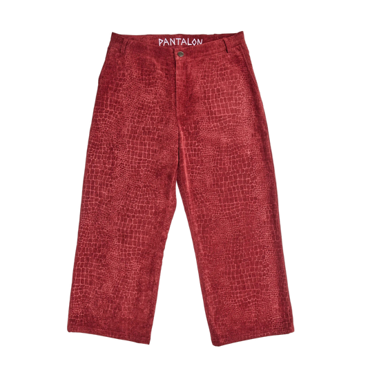 Red textured pants on a white background