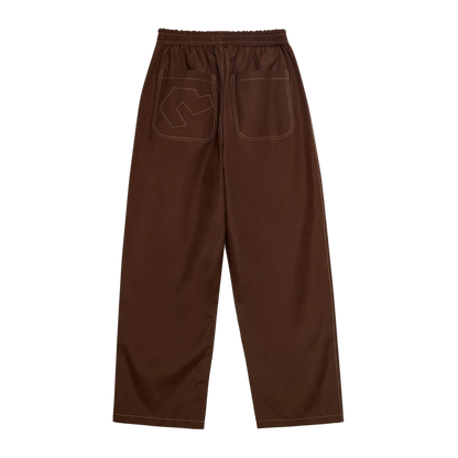 Brown pants with front pockets on a white background