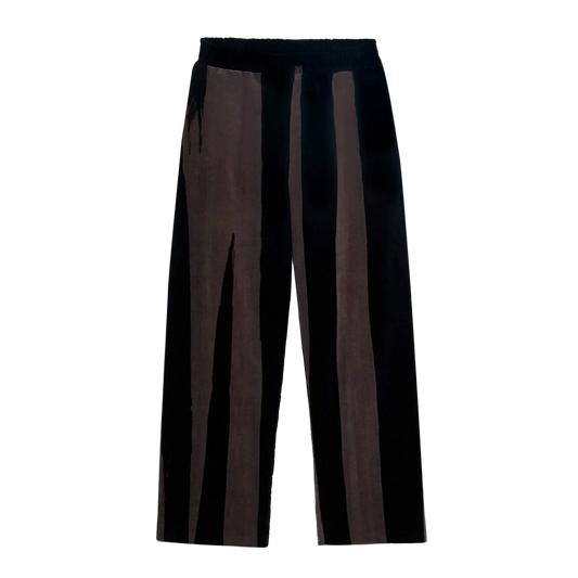 Black pants with sheer panels on a white background