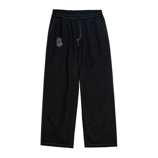 Black pants with a small logo on a white background